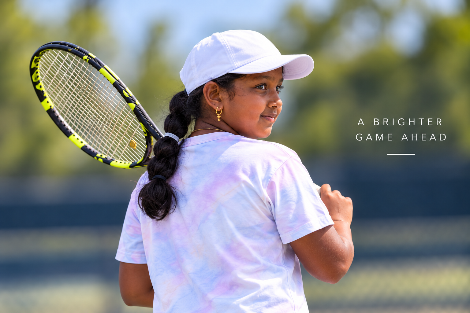 Priyanka looking back over her shoulder on the court